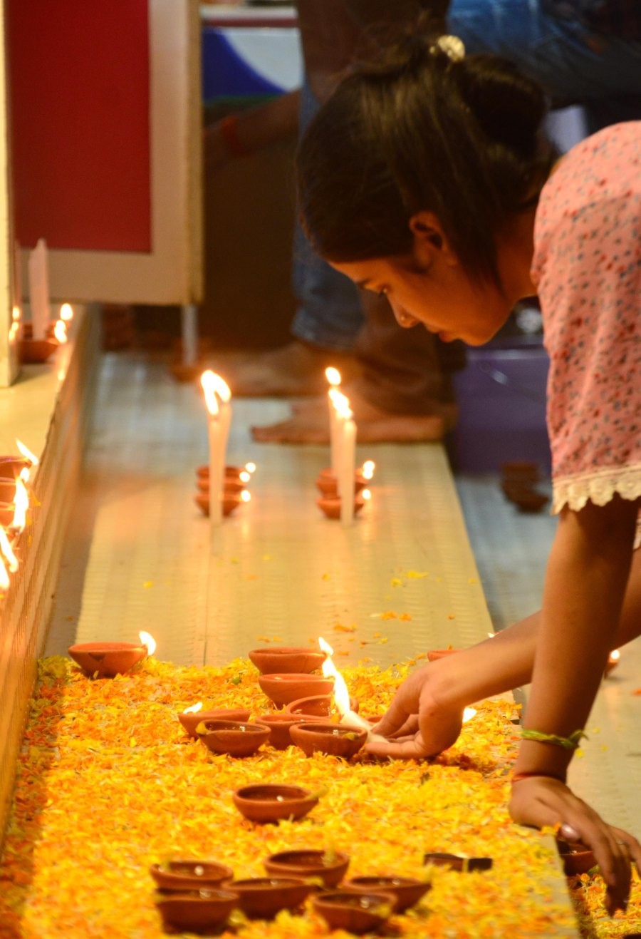 Devotees light Diya on the occasion of Diwali, the festival of lights in Dimapur, Nagaland on Sunday, 12 November 2023. (Photo by Caisii Mao)