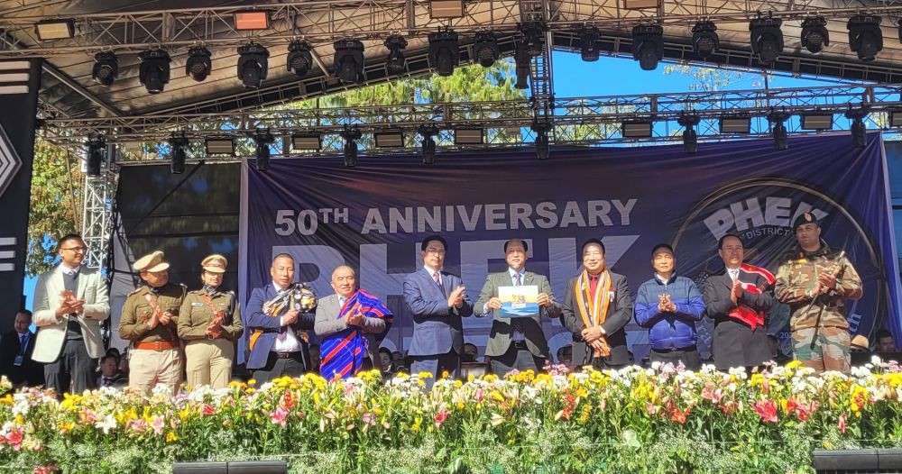 Neiphiu Rio releases Phek district 50th anniversary souvenir at Phek town on December 21. (Morung Photo)