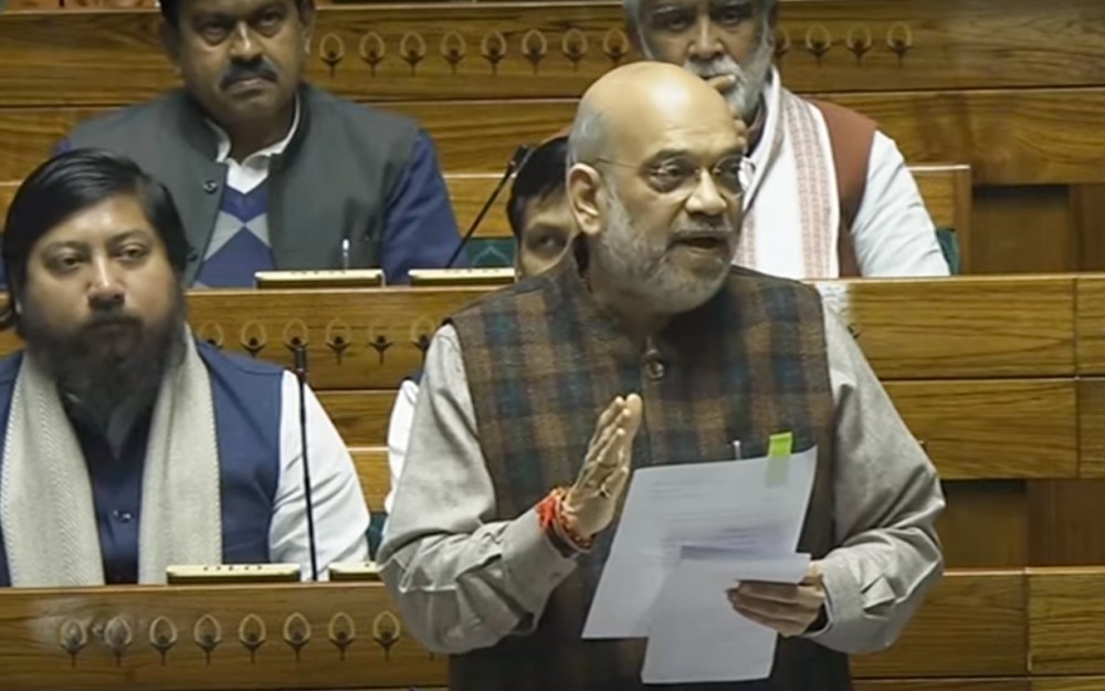 Home Minister Amit Shah speaks in the Lok Sabha during the Winter session of Parliament, in New Delhi on December 20. (IANS/Video Grab/Sansad Tv)