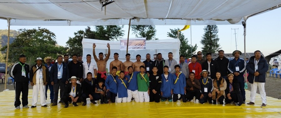 Winners of MYO 49th Naga wrestling meet with dignitaries.