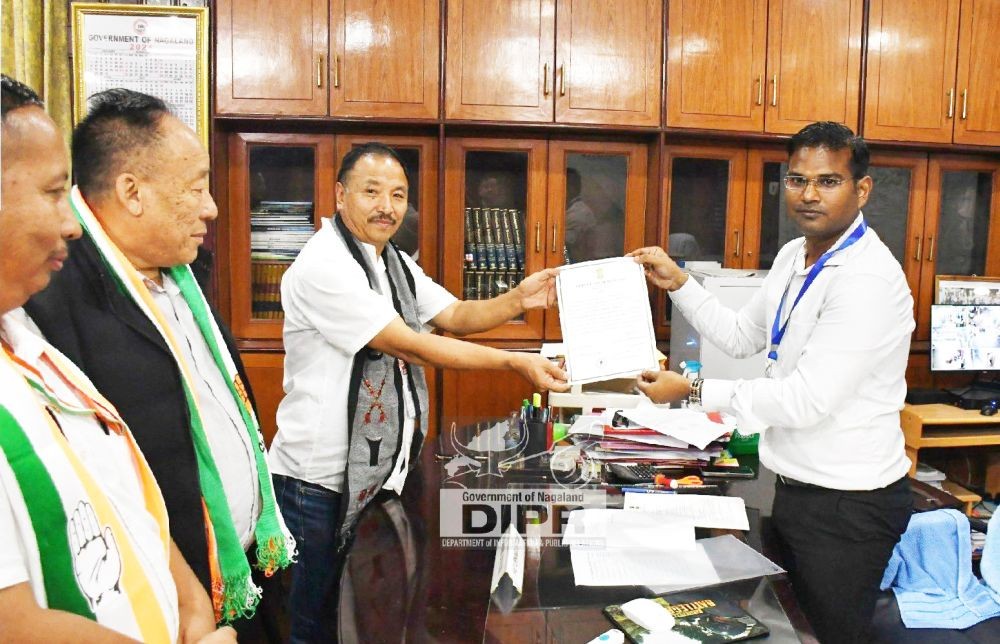 INC candidate, S Supongmeren Jamir is handed the winning certificate by Sushil Kumar, Commissioner & Returning Officer Nagaland on June 4 in Kohima. (DIPR Photo)