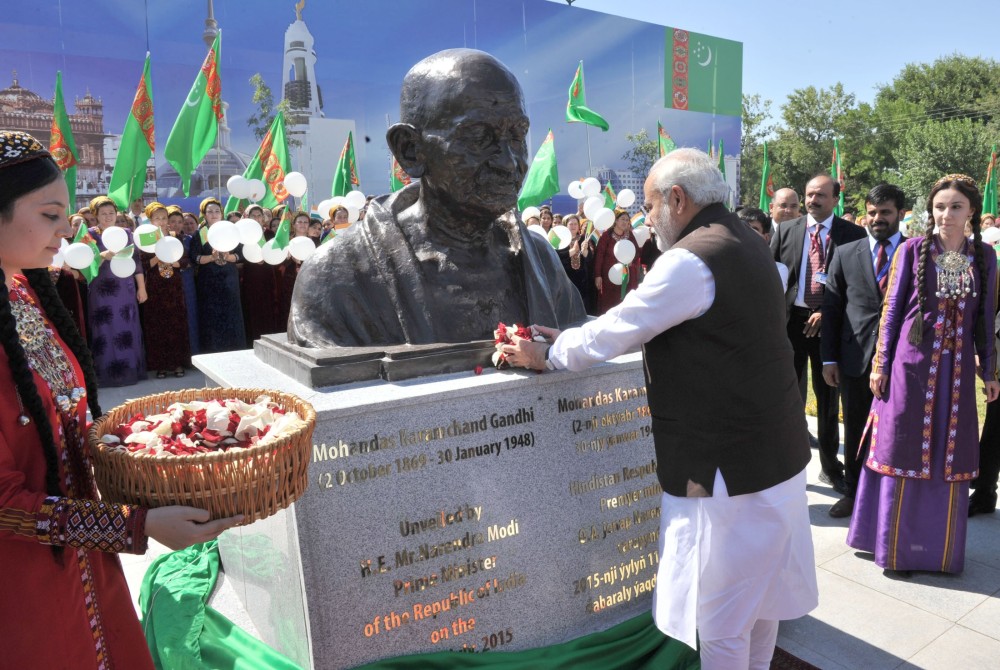 Prime Minister Narendra Modi pays floral tribute at the bust of the Mahatma Gandhi, at the Bagtyarlyk Sports Complex, in Ashgabat, Turkmenistan on July 11, 2015. (Photo: IANS/PIB)