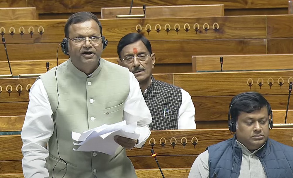 Minister of State for Finance Pankaj Chaudhary speaks in the Lok Sabha during the winter session of Parliament in New Delhi on Monday, December 2, 2024. (Photo: IANS/Sansad TV)
