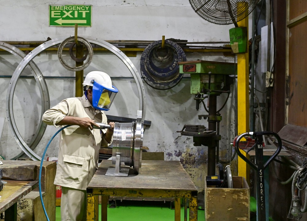 Workers are seen engaged in the manufacturing of components for Indian Space Research Organisation (ISRO) at a facility of Godrej Aerospace in Mumbai on Monday, July 10, 2023. (IANS File Photo)