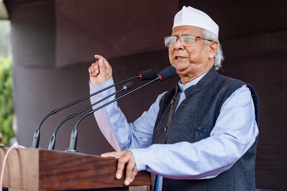 Chief Adviser of the Government of Bangladesh Professor Muhammad Yunus addresses the funeral prayer (namaz-e-janaza) of slain youth leader Sharif Osman Hadi at the South Plaza of the National Parliament (Jatiya Sangsad) in Dhaka, on Saturday, December 20, 2025. (IANS)